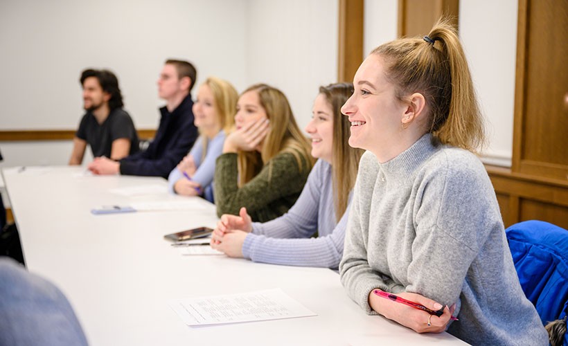 Students engage in classroom discussion.