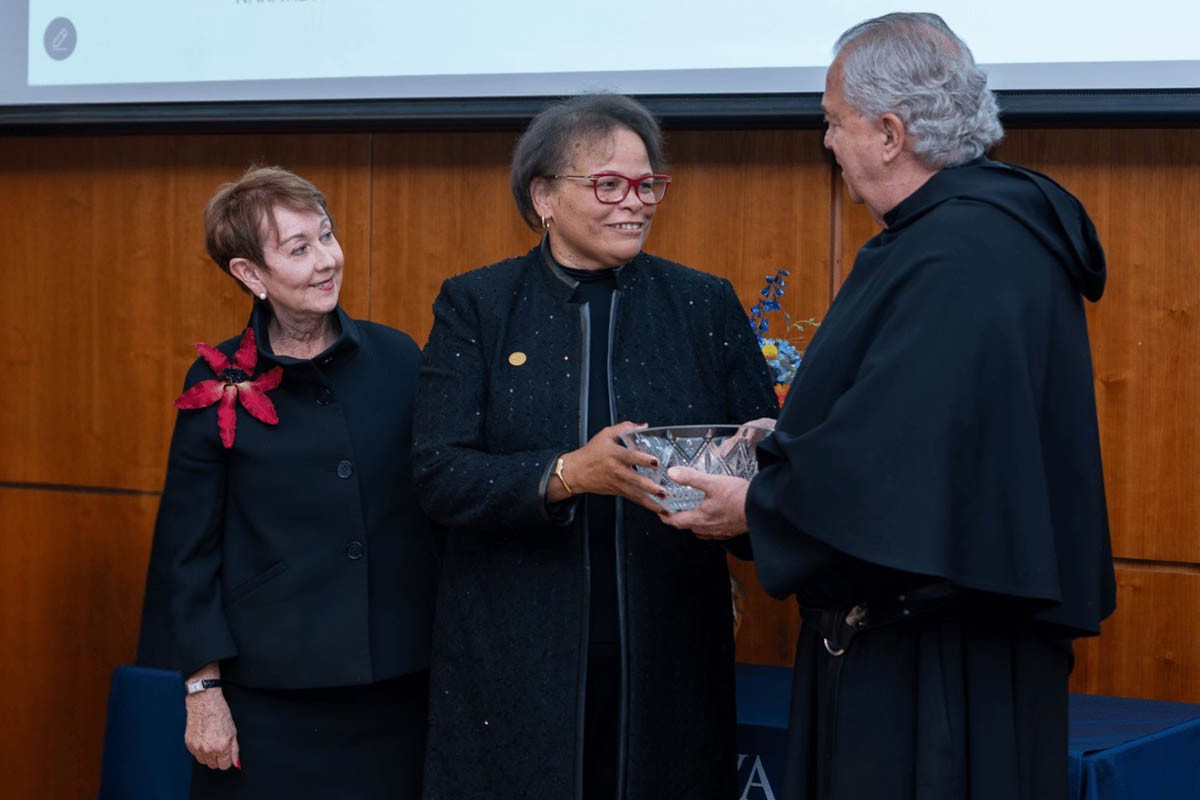 Dean Havens, Father Peter and the award recipient posing
