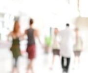 Abstract image of figures walking.