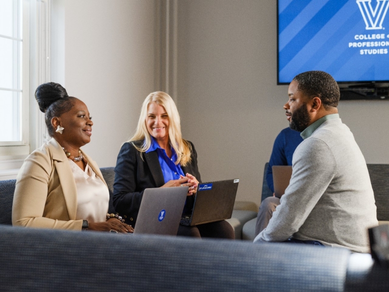 Alice Ford working with classmates