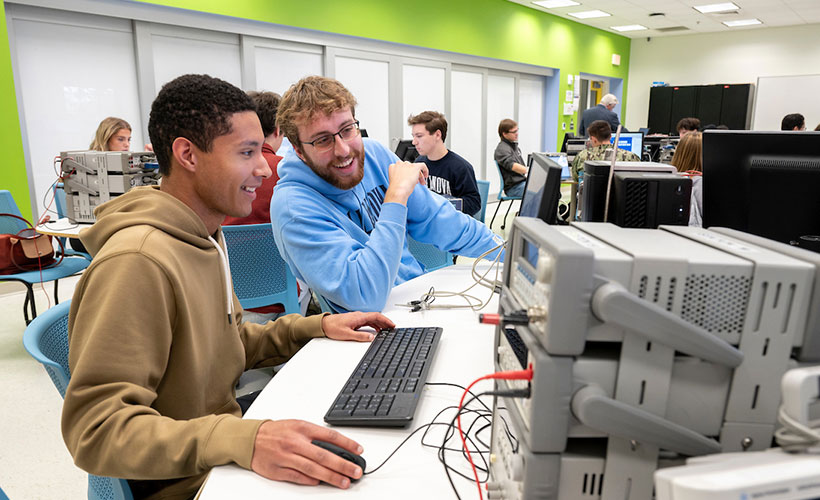 Students working in lab on computer