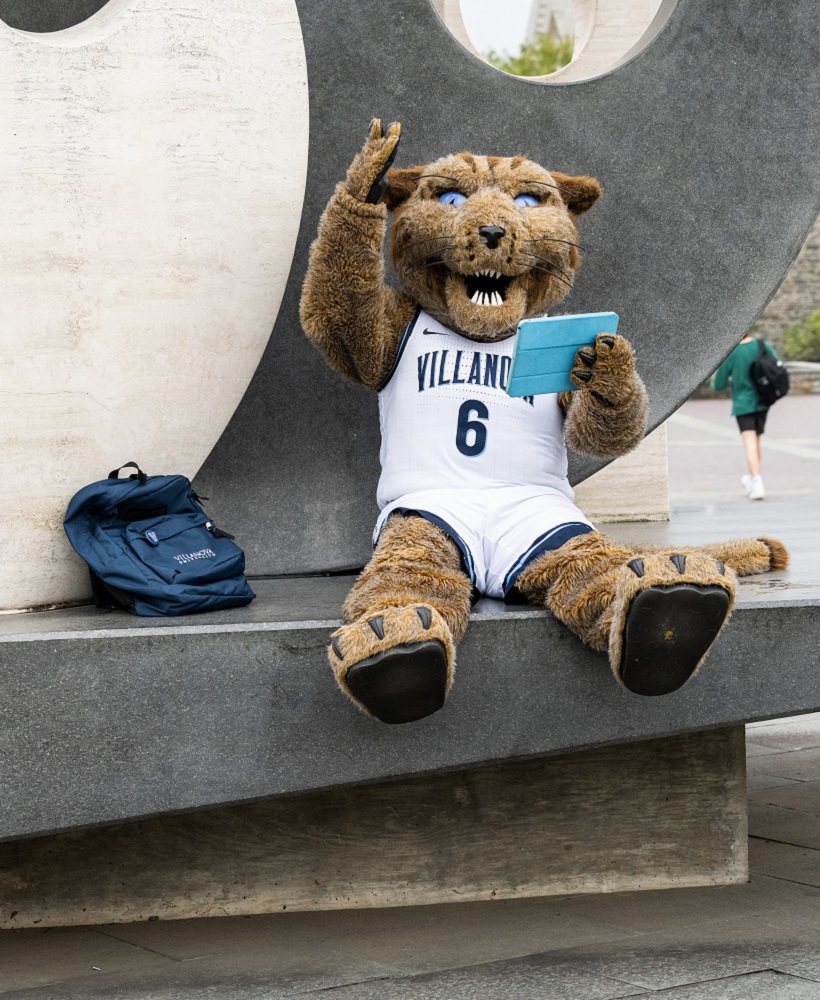 Will D. Cat poses at The Awakening with his tablet