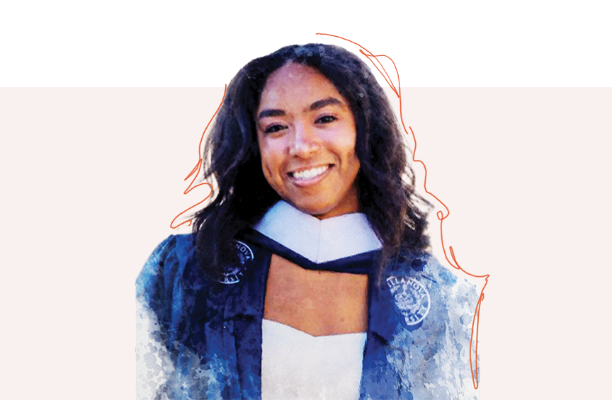 Headshot of Hannah Phillips smiling directly at the camera wearing a blue Villanova graduation gown.