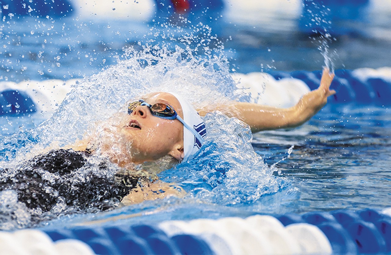 Kelly Montesi swimming the backstroke